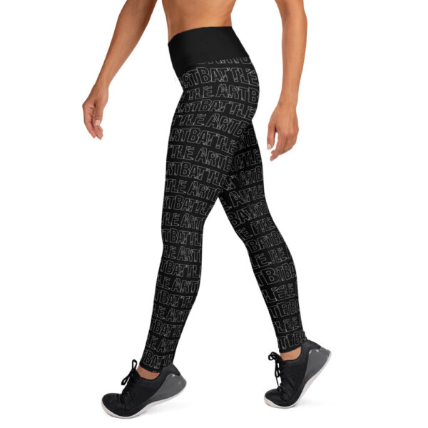 womens black leggings with all over art battle logo outline pattern